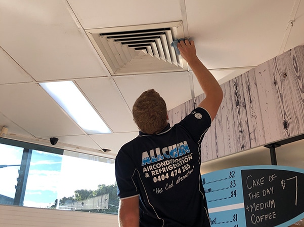 Man Checking the Air Vent — Air-Conditioning and Refrigeration in Sunshine Coast, QLD