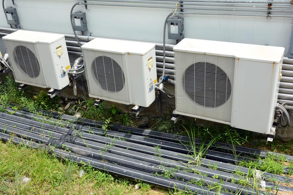 Row of air-condition compressor — Air-Conditioning and Refrigeration in Caloundra, QLD
