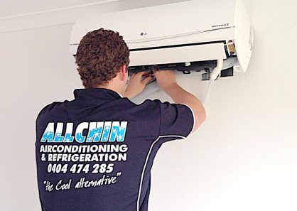 Allchin repairman fixing an air conditioner in a Sunshine Coast Home